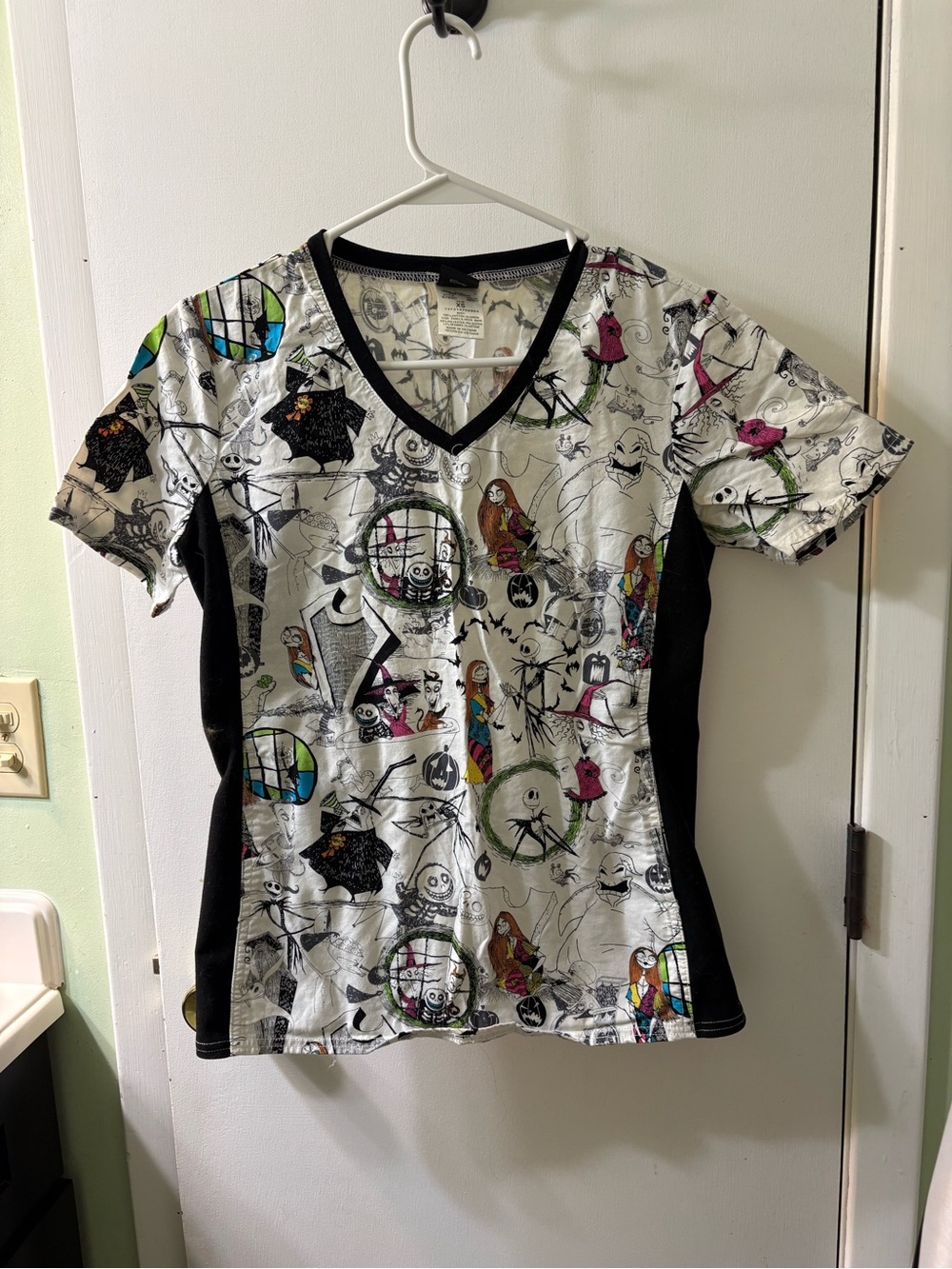 Disneys Nightmare Before Christmas Short Sleeve V-Neck Graphic Scrub Top